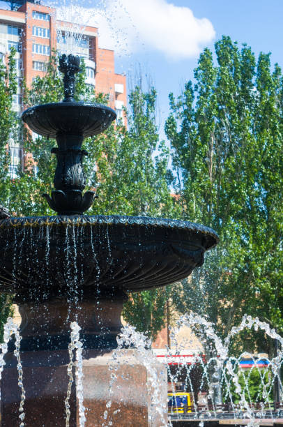 istock Fountain in city park on hot summer day 1146244458