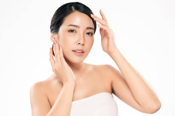 istock Young Woman with Clean Fresh Skin 1146246253