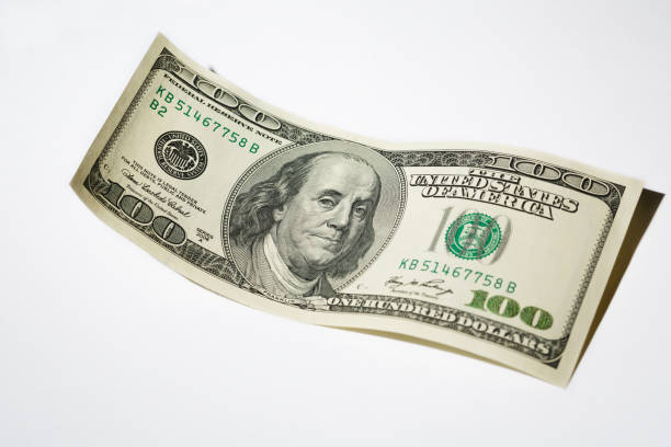 istock Close up hundred dollar banknote on white background 1146247001