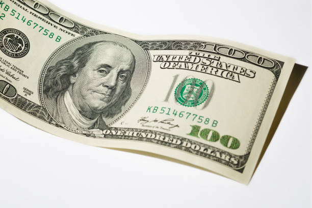 istock Close up hundred dollar banknote on white background 1146247112