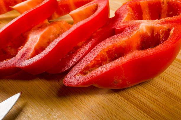 istock sliced fresh red paprika, bell pepper on bamboo cutting board 1146248050