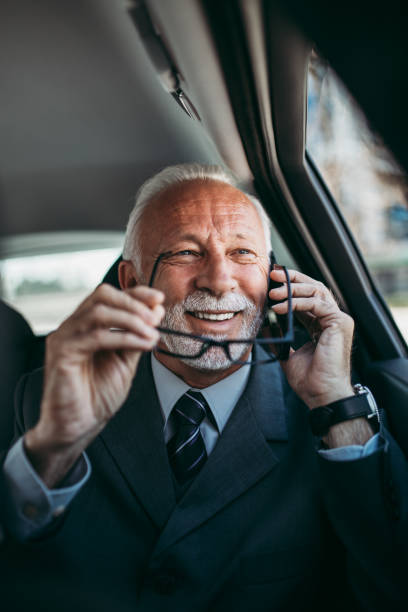 istock Senior business man in car 1146248137