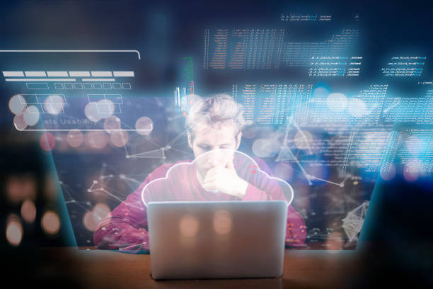 istock young man working on laptop futuristic icons and interface pop out from screens device b 1146250251