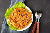 Traditional dish of polish cuisine - Bigos from fresh cabbage.