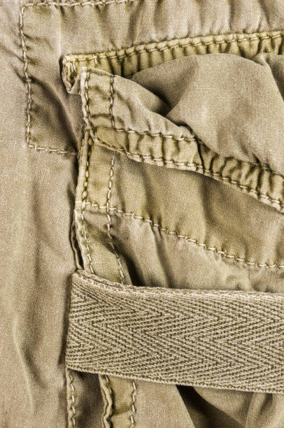 istock clothing items washed cotton fabric texture with seams 1146250813