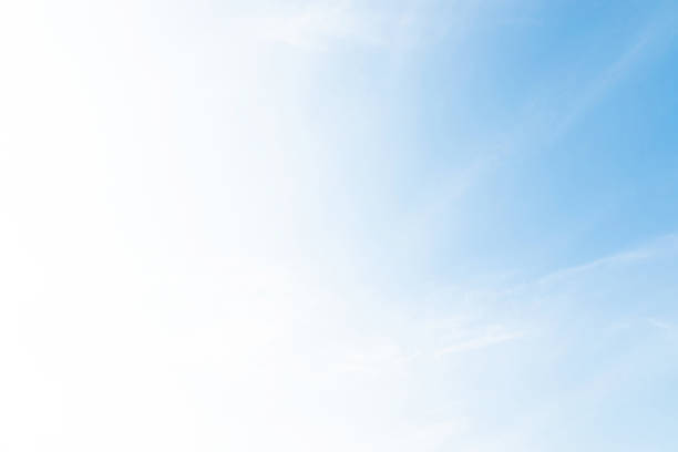 istock Beautiful clear blue sky background with tiny plain white cloud on morning time rays sunlight. space for text. soft focus. 1146253872