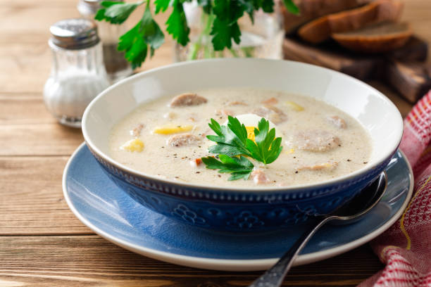 istock Traditional polish soup Zurek on wooden table 1146258003