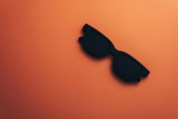 istock Black classic glasses on a Beautiful coral orange background. 1146258081