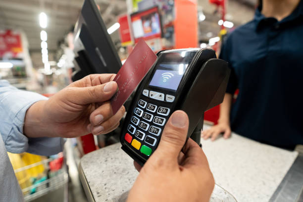 istock Customer making a contactless payment at the hardware store 1146259306