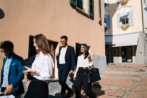 istock Business people walk along promenade 1146262607