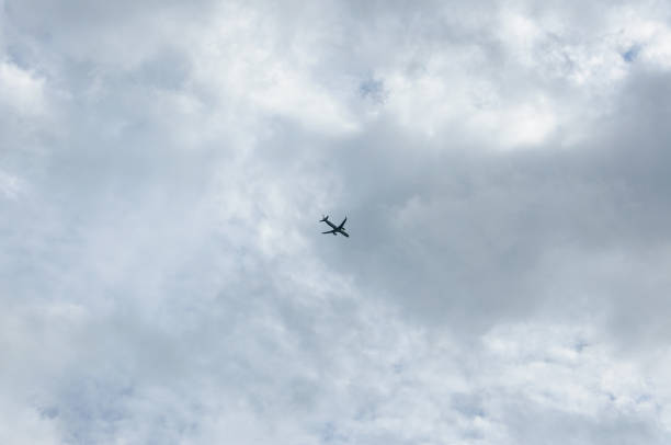 istock the plane on a background cloudy sky landing 1146263453