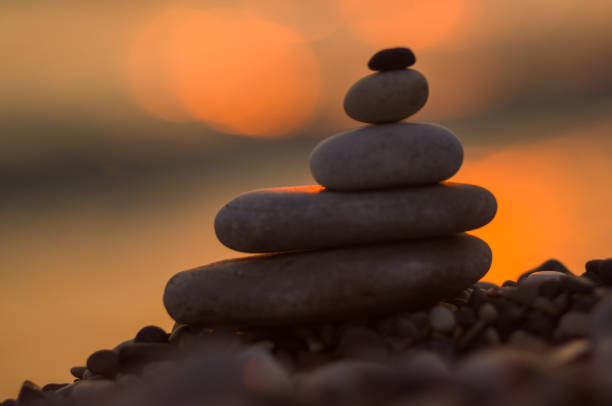 istock stack of zen stones on pebble beach 1146263878