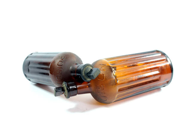 istock Vintage Brown Poison Bottles on White Background 1146268106