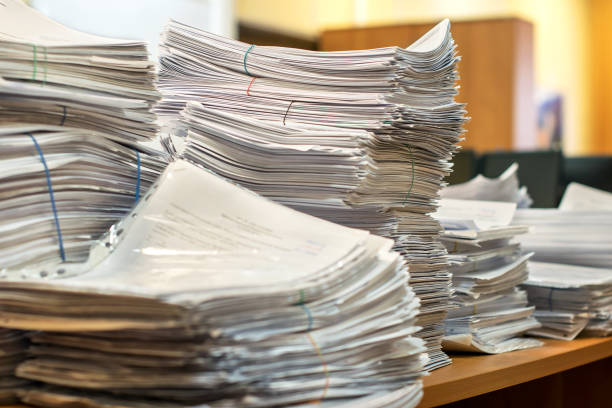 istock pile of paper documents in the office 1146268372
