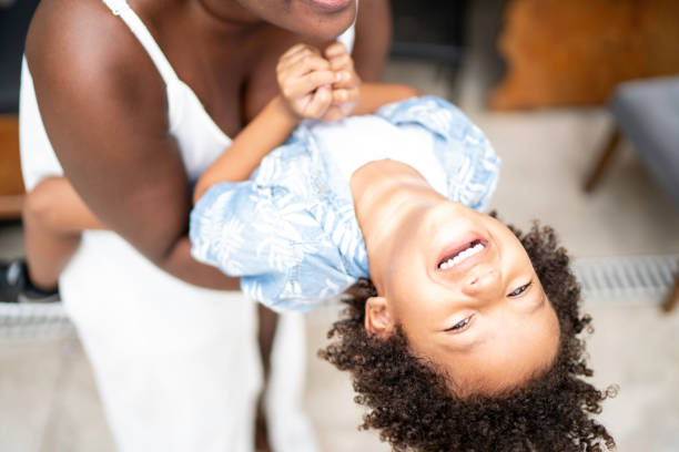 istock Mother carrying son, playing and laughing together 1146268501