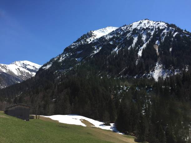 istock Alpine panorama with mountains surrounding Oberstdorf, Allgau Alps, Germany 1146275506