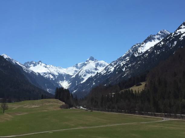 istock Alpine panorama with mountains surrounding Oberstdorf, Allgau Alps, Germany 1146275560