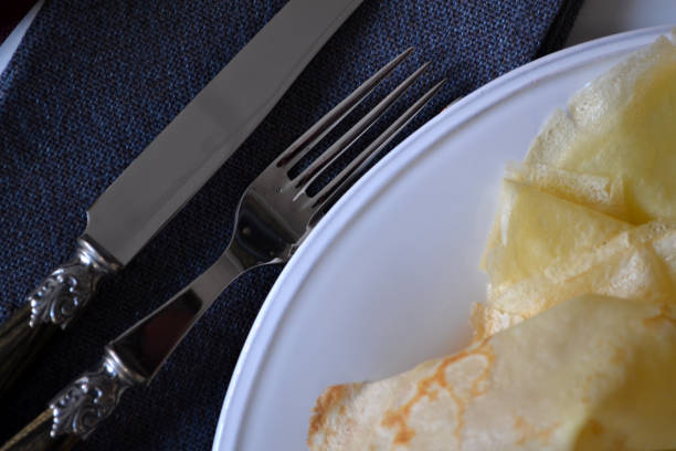 istock The pancakes on a plate with cutlery. Close up. 1146277531