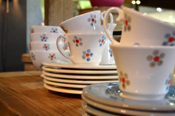 istock Ceramic coffee cups on a wooden shelf. 1146277597