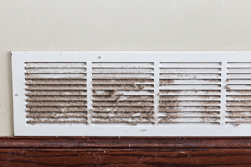 A filty dirty air duct - register.