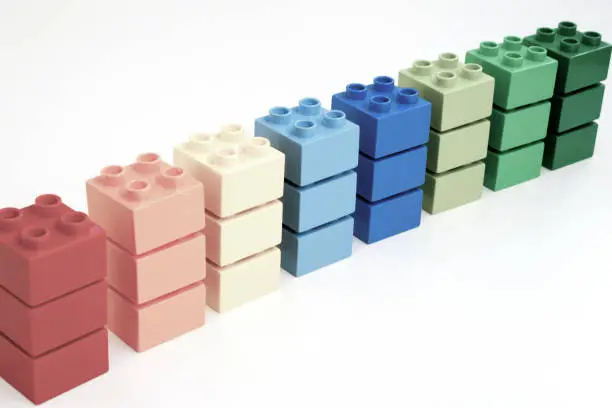 Samples of vintage coloured plastic block Duplo bricks
