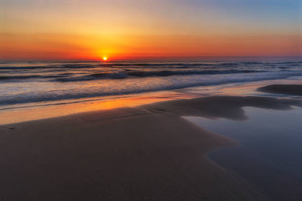 istock Sunrise on the sea coast 1146279627