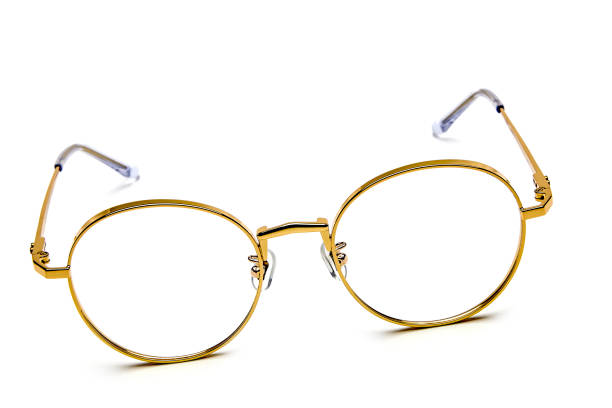 istock Gold framed glasses on white background 1146281359