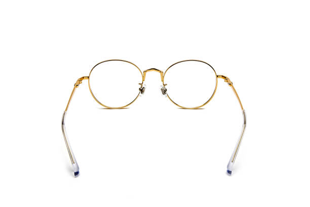 istock Gold framed glasses on white background 1146281361