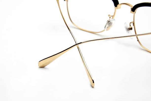istock Golden half frame of flat glasses on white background 1146282152