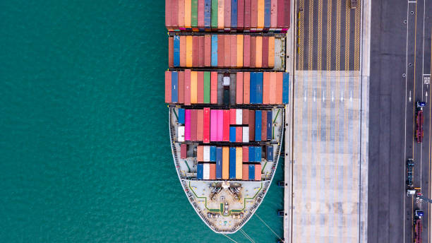 istock Top view Aerial view cargo ship, loading and unloading goods at the deep sea port Singapore 1146284688