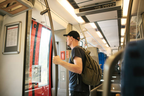 istock Tourist guy rides in train 1146285026