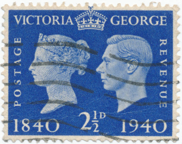 Vintage stamp printed in Great Britain 1937 shows Queen Victoria and King George VI POLTAVA, UKRAINE - APRIL 21, 2019. Vintage stamp printed in Great Britain 1937 shows Queen Victoria and King George VI george vi stock pictures, royalty-free photos & images