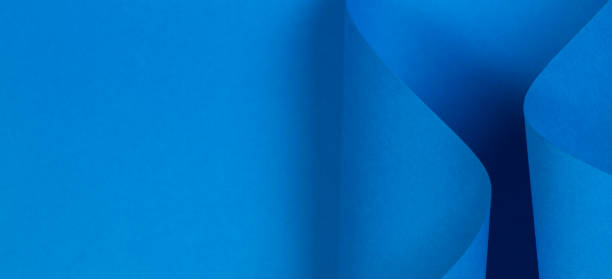 istock Abstract light blue paper background in geometric shapes 1146289160