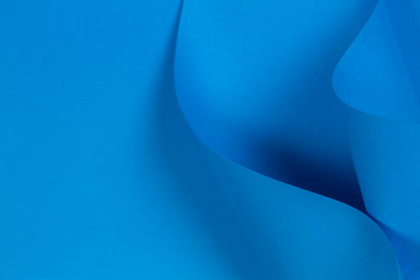 Abstract light blue paper background in geometric shapes