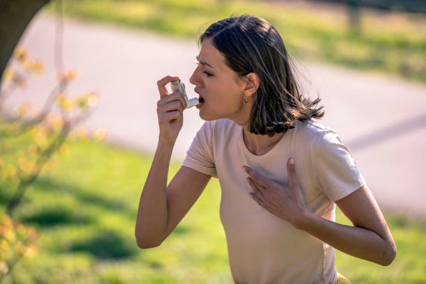 istock Woman Using Asthma Inhaler Outdoor 1146290027