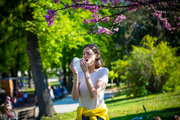 istock Attractive Woman Outdoors is Having Allergy 1146290398