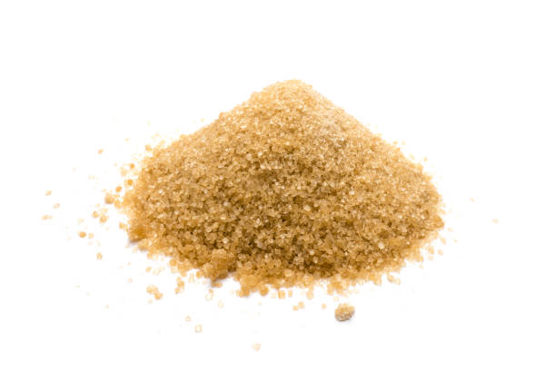 istock Brown cane sugar isolated on white background 1146291504
