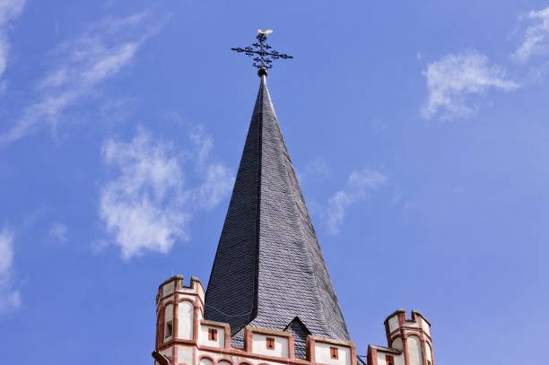 istock Gothic spire with a crucifix on the top (Bacharach, Germany, Europe) 1146291988