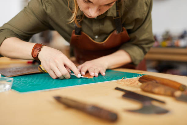 istock Woman in Leatherworking Shop 1146296399