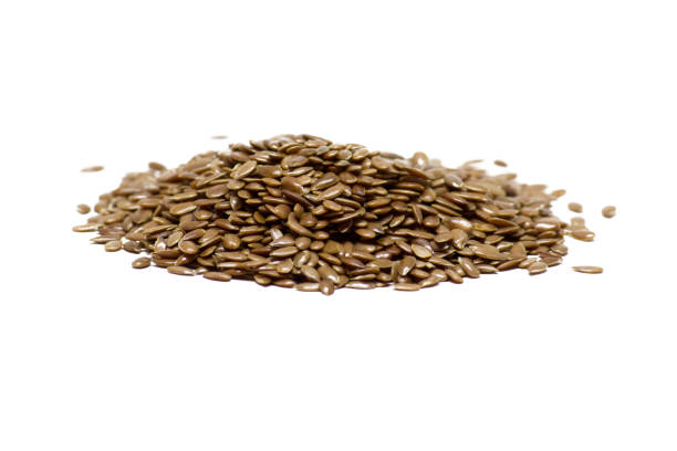 istock Brown flaxseeds isolated on white 1146297051