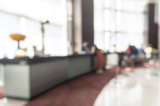 istock Concierge service blur background reception counter of hotel, restaurant or apartment's front desk in luxury reception hall with staff working for serving tourist guest or check-in customers 1146297052