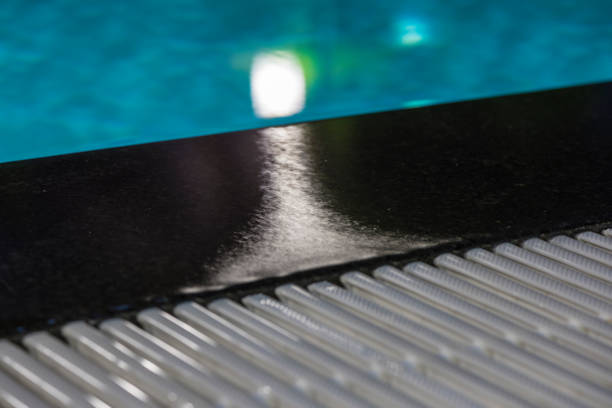 istock Swimming pool at night. Reflection of light. 1146300731