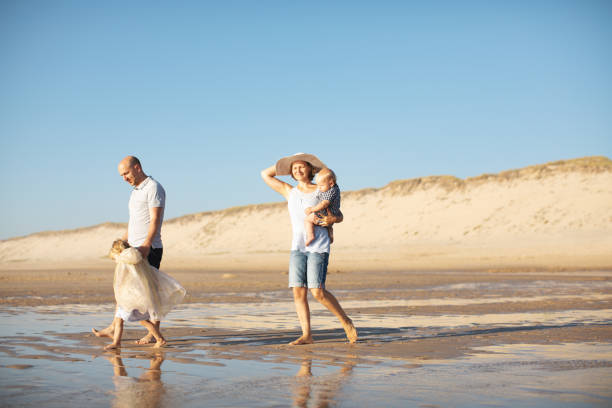 istock Family at the beach 1146300862