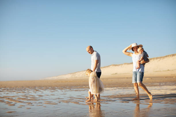 istock Family at the beach 1146301731