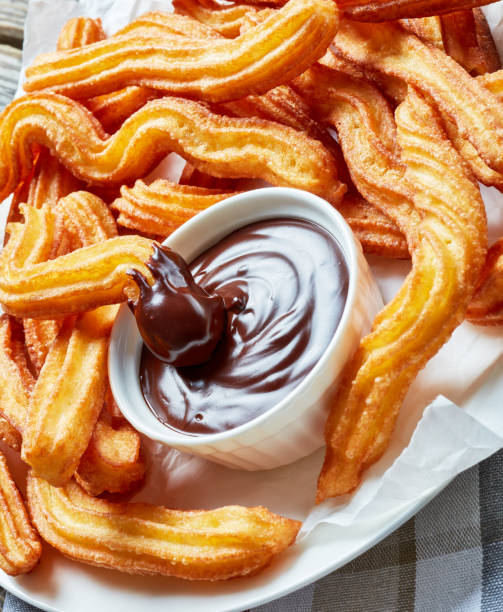 istock Traditional Spanish dessert churros on a white platter 1146309913