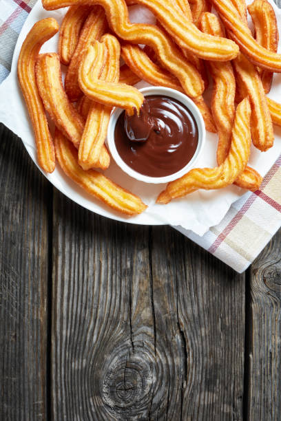 istock Traditional Spanish dessert churros on a white platter 1146309969