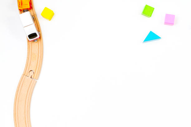 istock Wooden toy train with colorful blocks on white background 1146311370