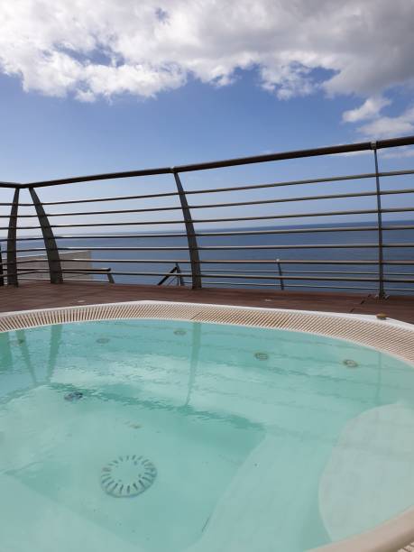 istock hot tub - Sea view 1146317284