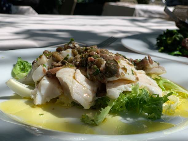 istock Fish with Olives and lemon cream 1146318586