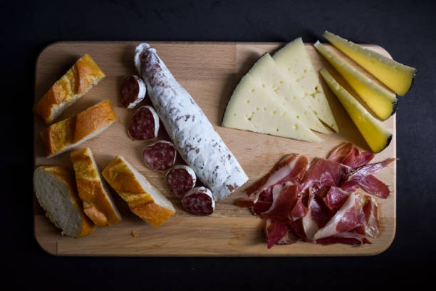 istock Spanish Iberian Assortment, cheese, ham, sausage and bread 1146320027